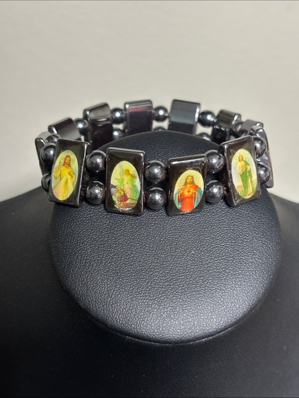 Religious Hematite Stretch Bracelet with Multi-Panel Icon Accents